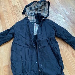 Burberry rain coat.